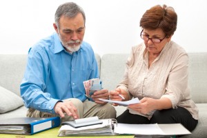 couple calculating home finances
